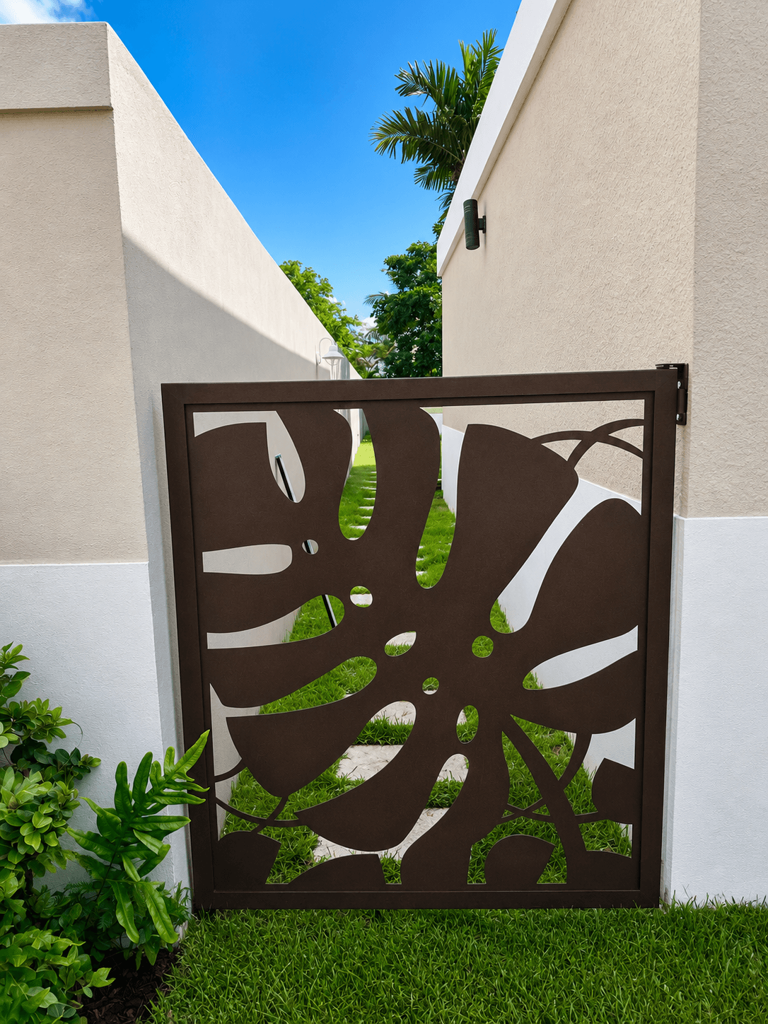 Monstera leaf garden gate