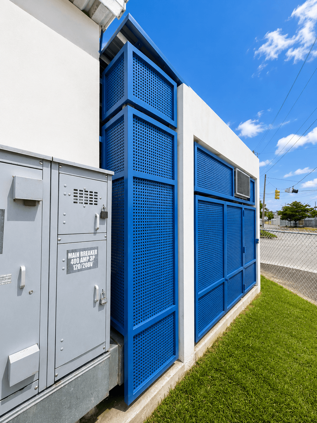 Blue perforated utility enclosure panels